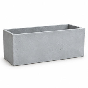 Grey rectangular cement planter on a white studio background