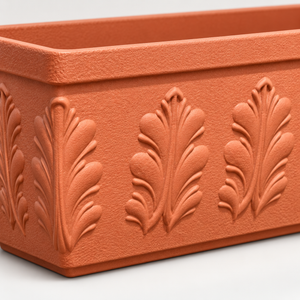 Close-up of raised floral relief on brick-red PRM planter
