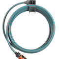 an orange and blue hose connected to a white cord