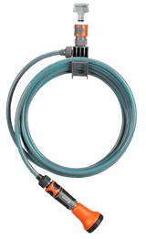 an orange and blue hose connected to a white cord