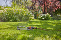 a sprinkler is spraying water on a lawn