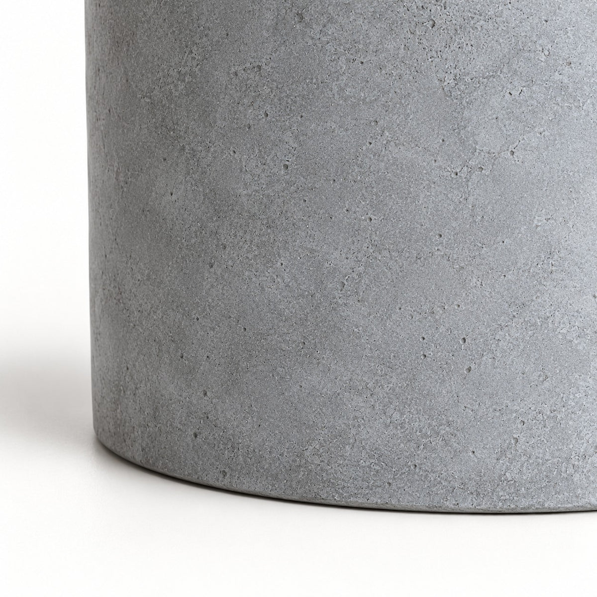 Cylinder cement planter — exterior cement surface and curved lower edge