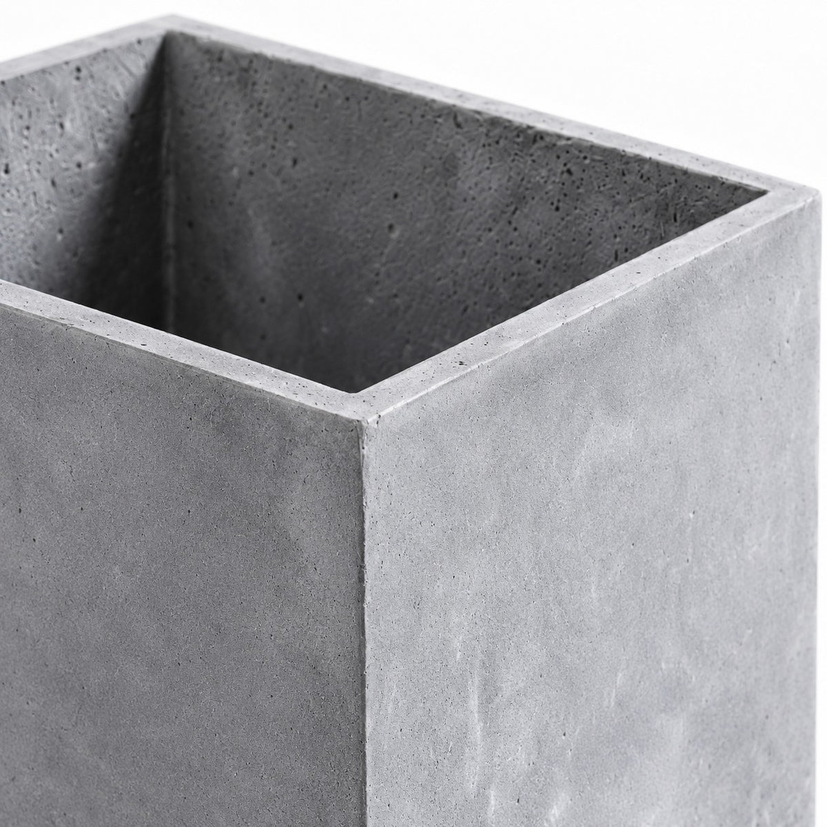 Square cement planter — straight rim and natural cement surface detail