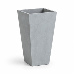 Tall tapered square cement planter on white background